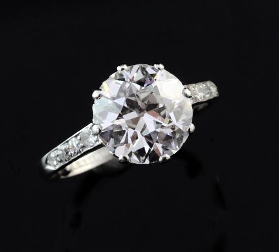 A 1940s/1950s platinum and single stone diamond ring with diamond set shoulders, size L.